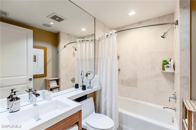 full bathroom with toilet, vanity, and shower / bathtub combination with curtain