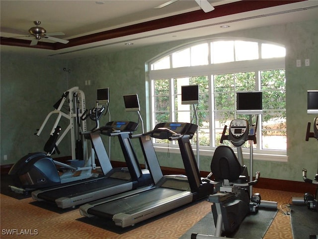 workout area featuring carpet floors and ceiling fan