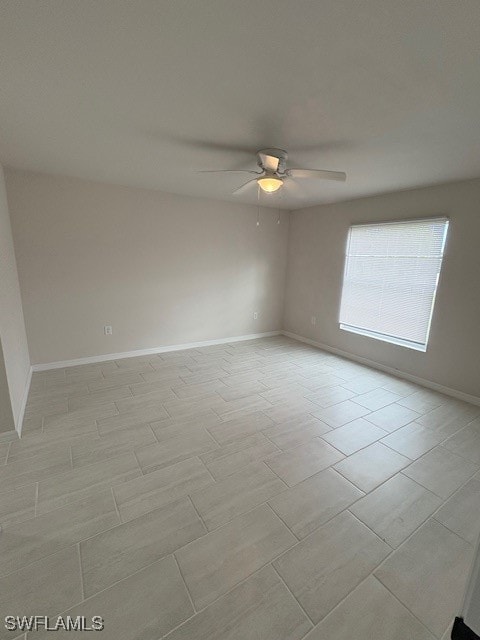 empty room featuring ceiling fan