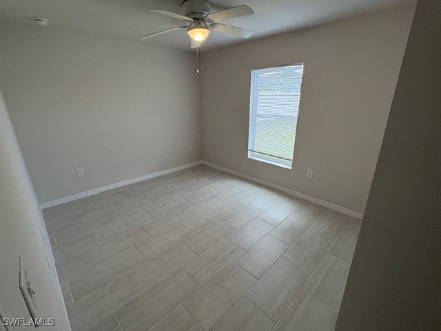 empty room featuring ceiling fan