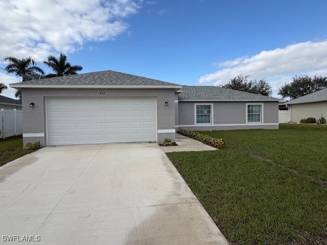 single story home with a front lawn