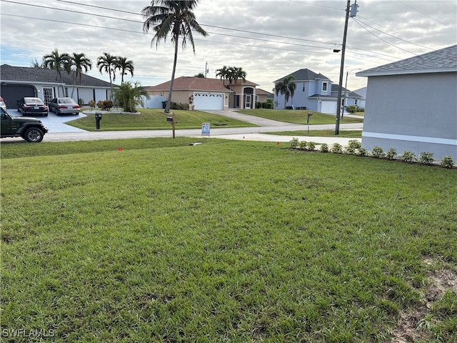 view of yard featuring a garage