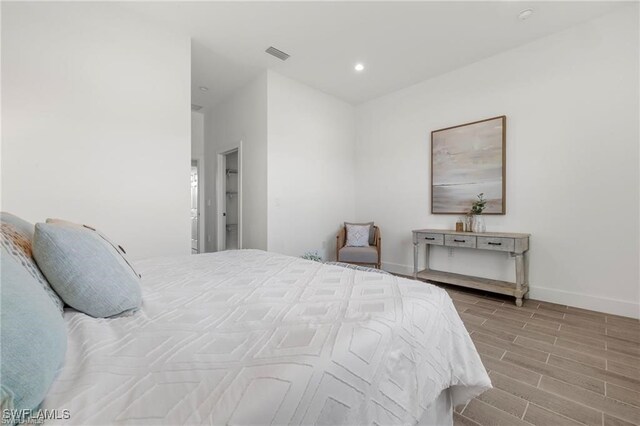 bedroom with light hardwood / wood-style floors