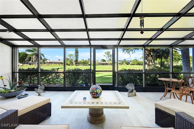 sunroom / solarium with a wealth of natural light