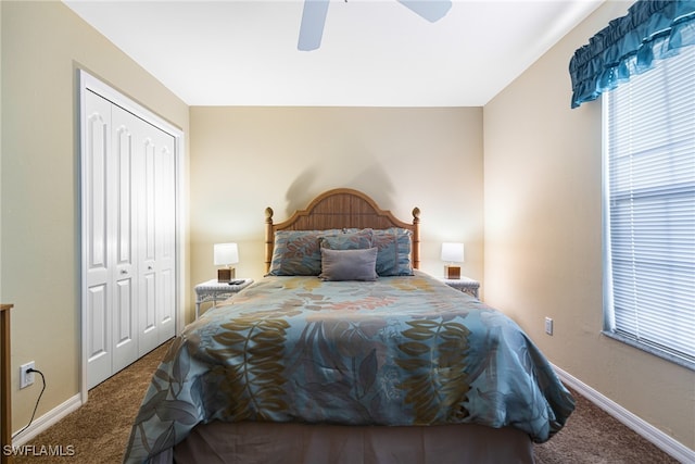 carpeted bedroom featuring ceiling fan and a closet