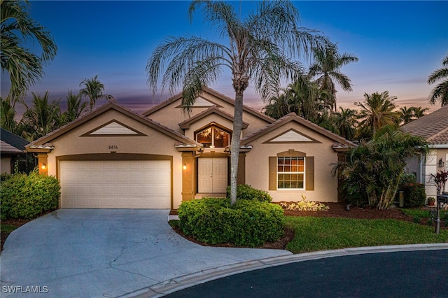 view of front of home with a garage