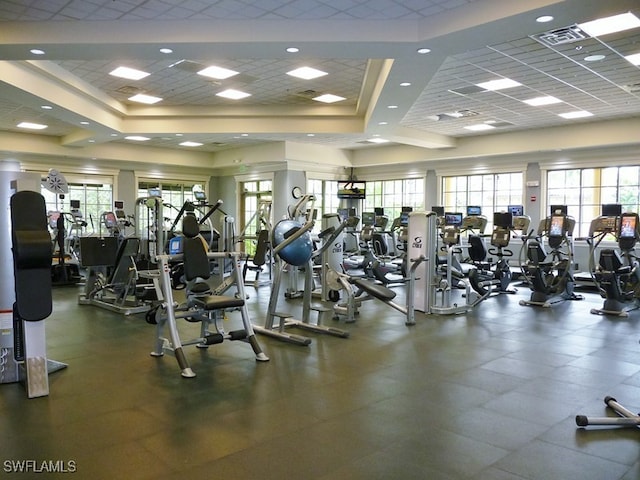 exercise room featuring a drop ceiling