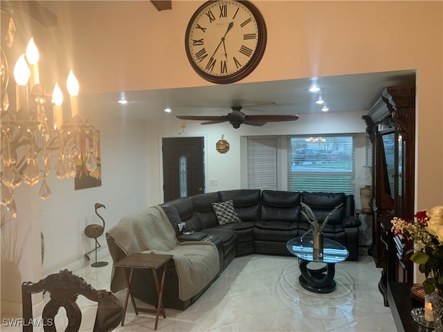 living room with ceiling fan and light tile patterned floors