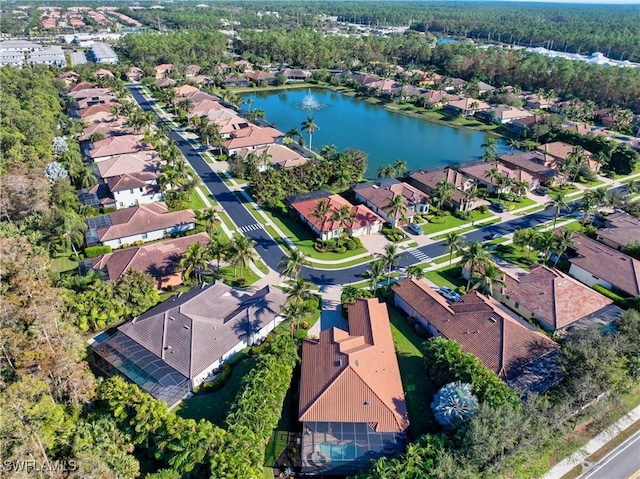 7399 Acorn Way, Naples, FL 34119 - aerial view of property and surrounding area with nearby suburban area and a large body of water