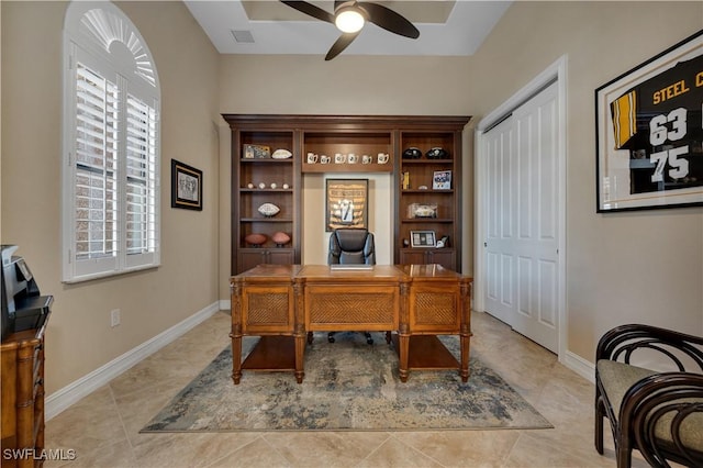 7399 Acorn Way, Naples, FL 34119 - home office featuring ceiling fan, light tile patterned floors, and baseboards