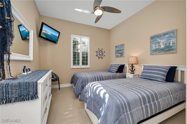 7399 Acorn Way, Naples, FL 34119 - bedroom with light colored carpet, baseboards, and a ceiling fan