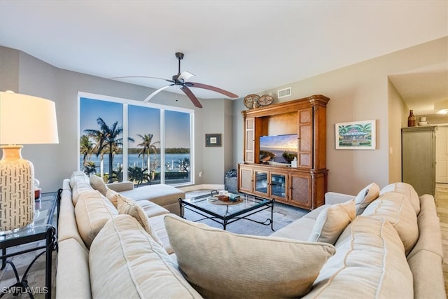 living room featuring ceiling fan