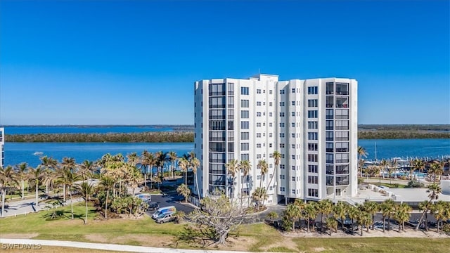 view of building exterior with a water view