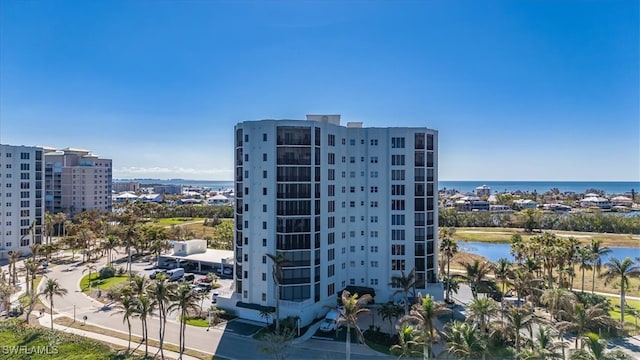 view of building exterior with a water view