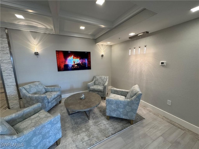 cinema featuring beamed ceiling and coffered ceiling