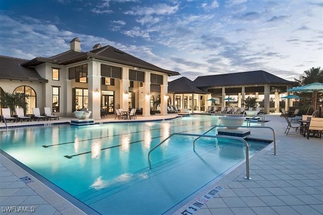 view of pool featuring a patio area