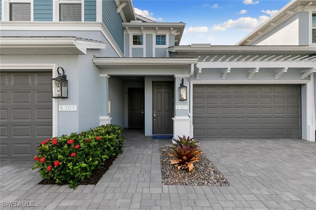 property entrance with a garage