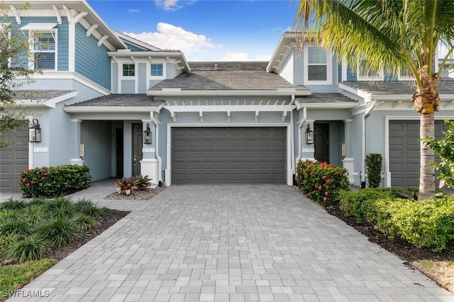 view of front of property with a garage