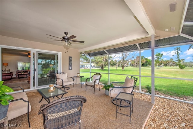 view of patio featuring ceiling fan