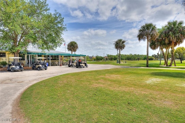 1656 Saint Clair Ave E, North Fort Myers, FL 33903 - view of home's community with a lawn