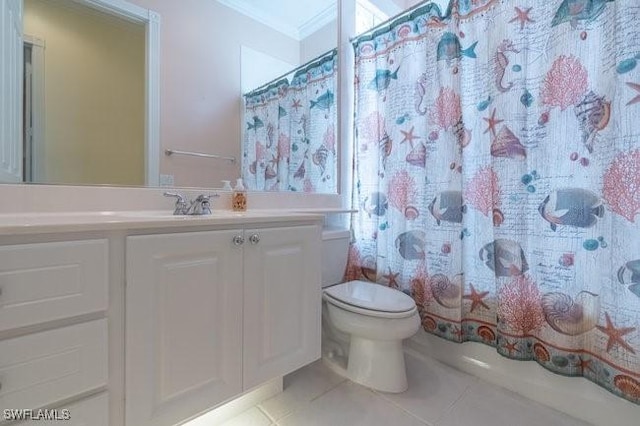 bathroom with toilet, tile patterned flooring, vanity, and ornamental molding