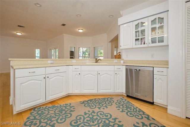 kitchen with crown molding, sink, light hardwood / wood-style flooring, dishwasher, and white cabinetry