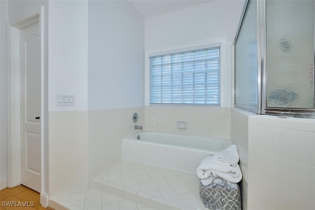 bathroom with a washtub