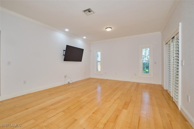 interior space featuring light hardwood / wood-style flooring and ornamental molding