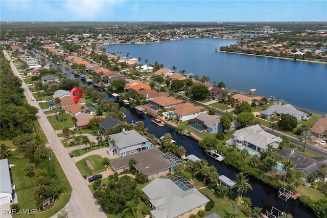 bird's eye view with a water view