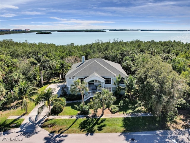 bird's eye view with a water view