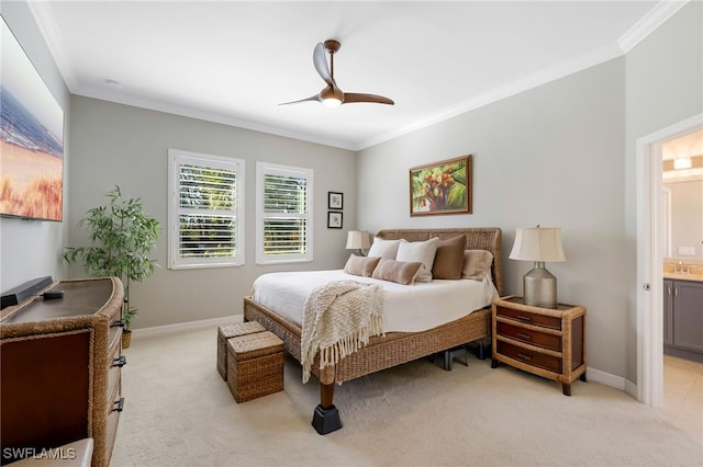 bedroom with ensuite bathroom, ceiling fan, ornamental molding, and light colored carpet