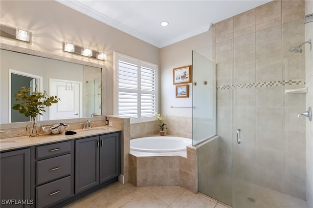 bathroom featuring tile patterned floors, vanity, crown molding, and independent shower and bath