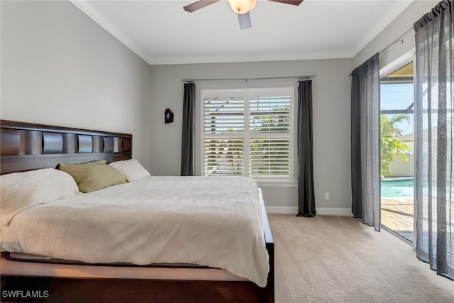 carpeted bedroom featuring access to exterior, ceiling fan, and ornamental molding