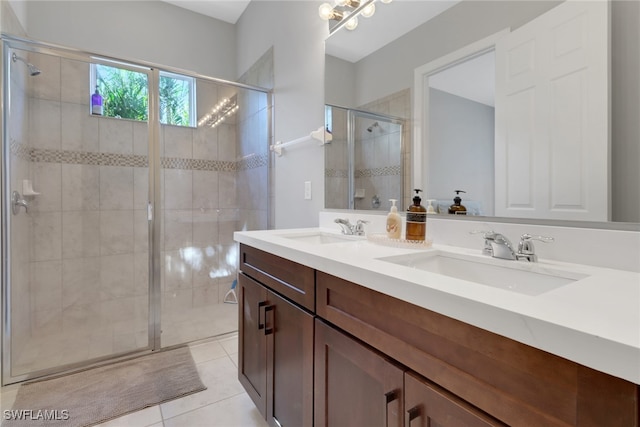 bathroom featuring vanity, tile patterned floors, and an enclosed shower