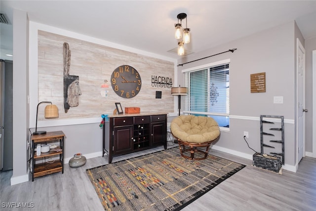 sitting room with light wood-type flooring