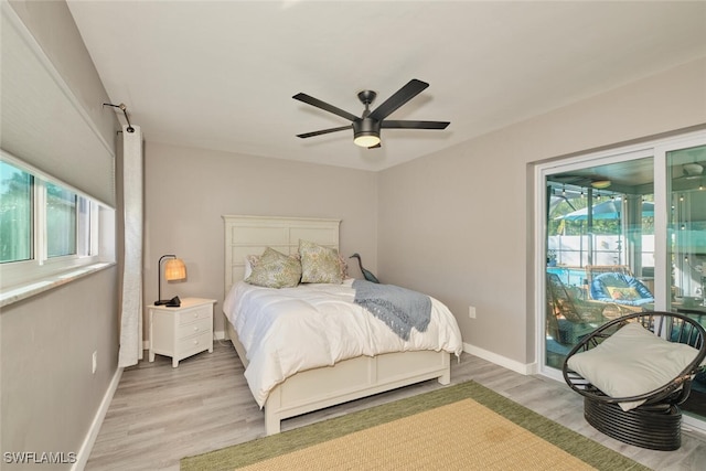 bedroom with ceiling fan, access to outside, and light hardwood / wood-style flooring