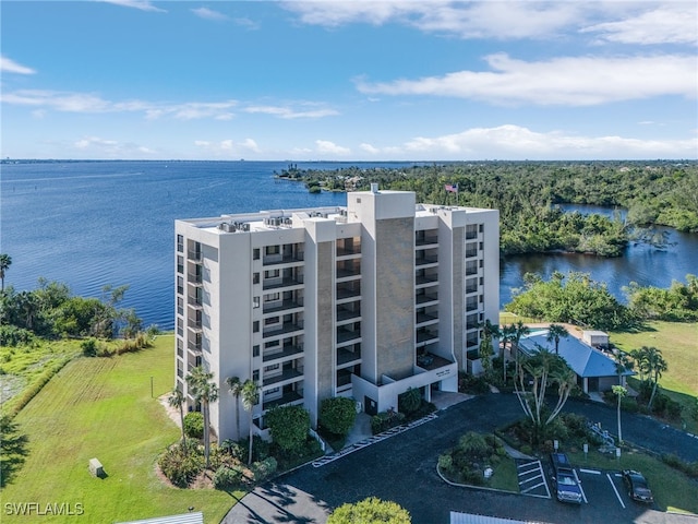 birds eye view of property with a water view