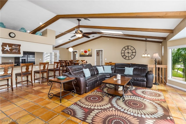 living room featuring ceiling fan with notable chandelier, lofted ceiling with beams, and tile patterned flooring