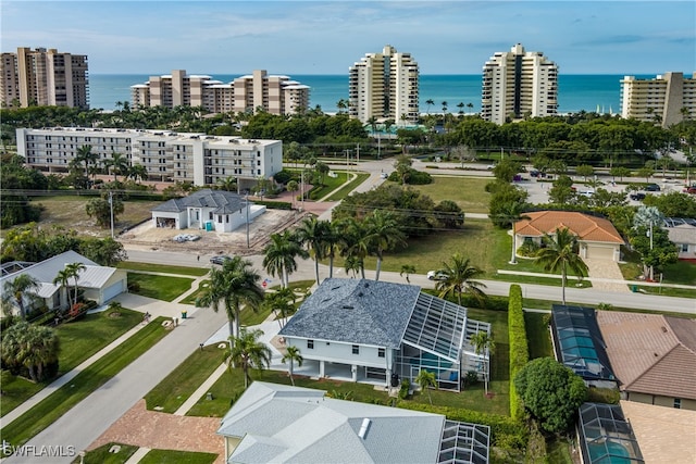 drone / aerial view featuring a water view