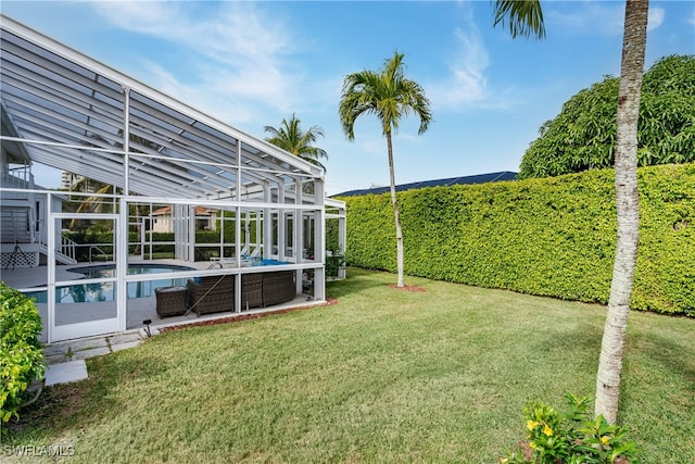 view of yard featuring a lanai