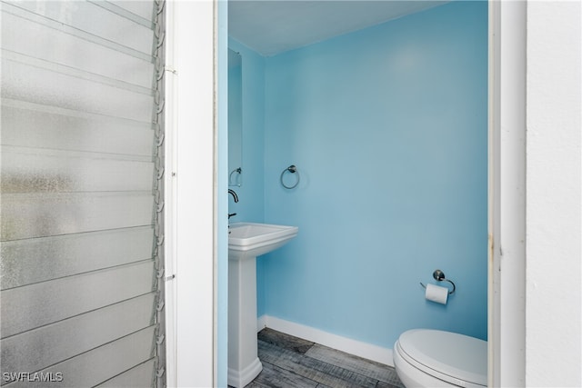 bathroom with toilet and sink