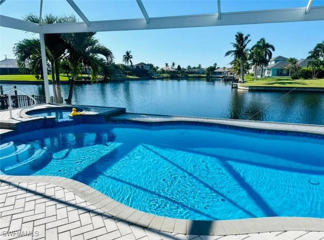 view of pool featuring a water view