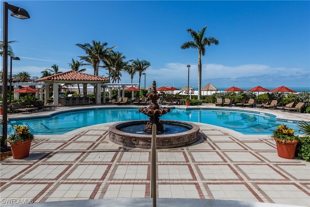 view of swimming pool featuring a gazebo