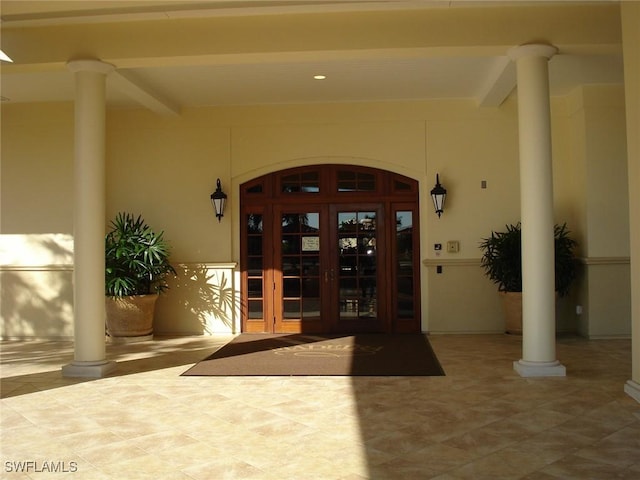 doorway to property featuring french doors