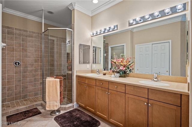 bathroom featuring tile patterned flooring, vanity, an enclosed shower, and ornamental molding