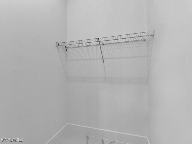 6006 Stratton Rd, Fort Myers, FL 33905 - spacious closet featuring marble look tiles