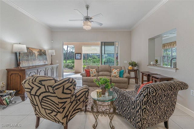 living room featuring light tile patterned floors, ceiling fan, and crown molding