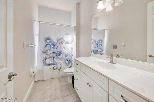 bathroom with a shower with curtain, vanity, toilet, and tile patterned flooring