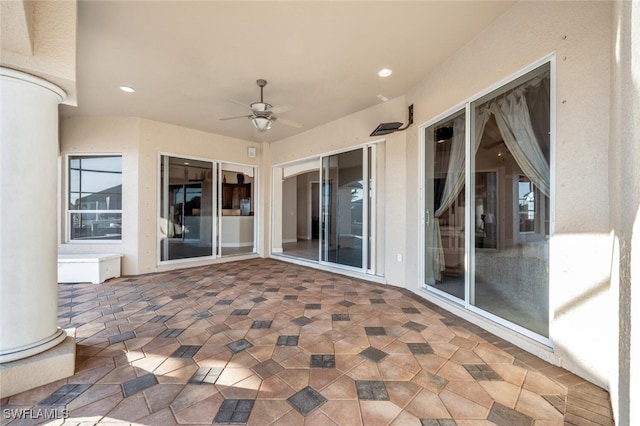 view of patio / terrace with ceiling fan