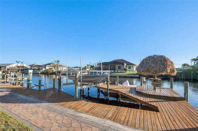 view of dock with a water view